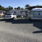 Caravans parked at Leithfield Beach Holiday Park in North Canterbury